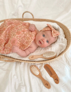 newborn baby swaddle with matching bow headband