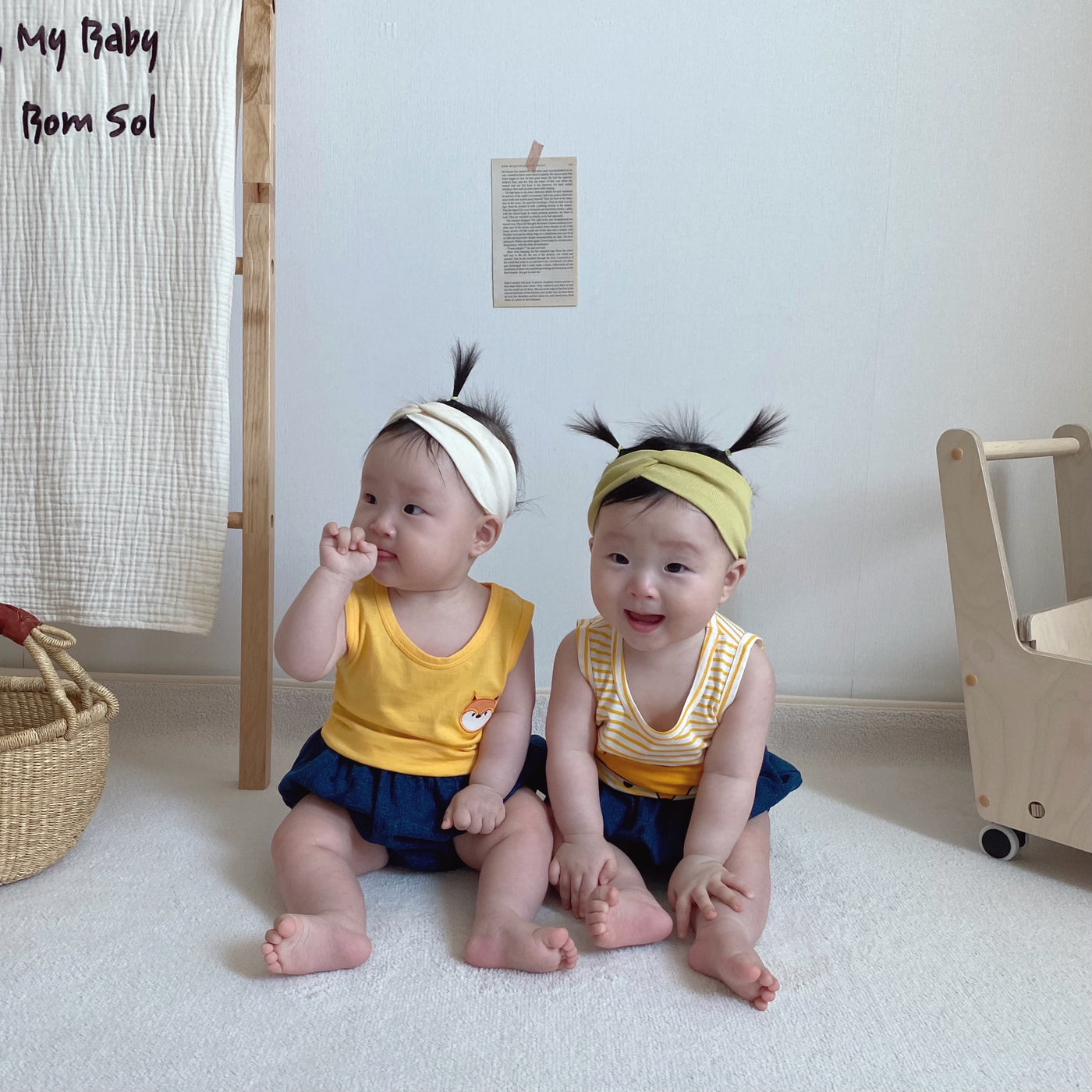 Babies wearing yellow fox printed sleeveless singlet