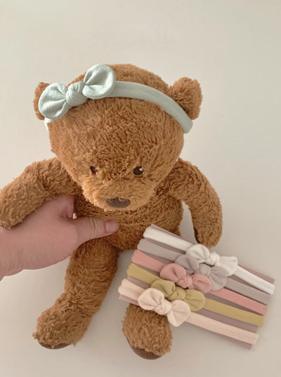 Mini bow headband for baby girls and newborn, with a teddy bear