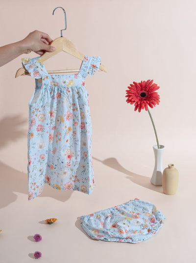 baby girls dress in blue floral print, with matching bloomers