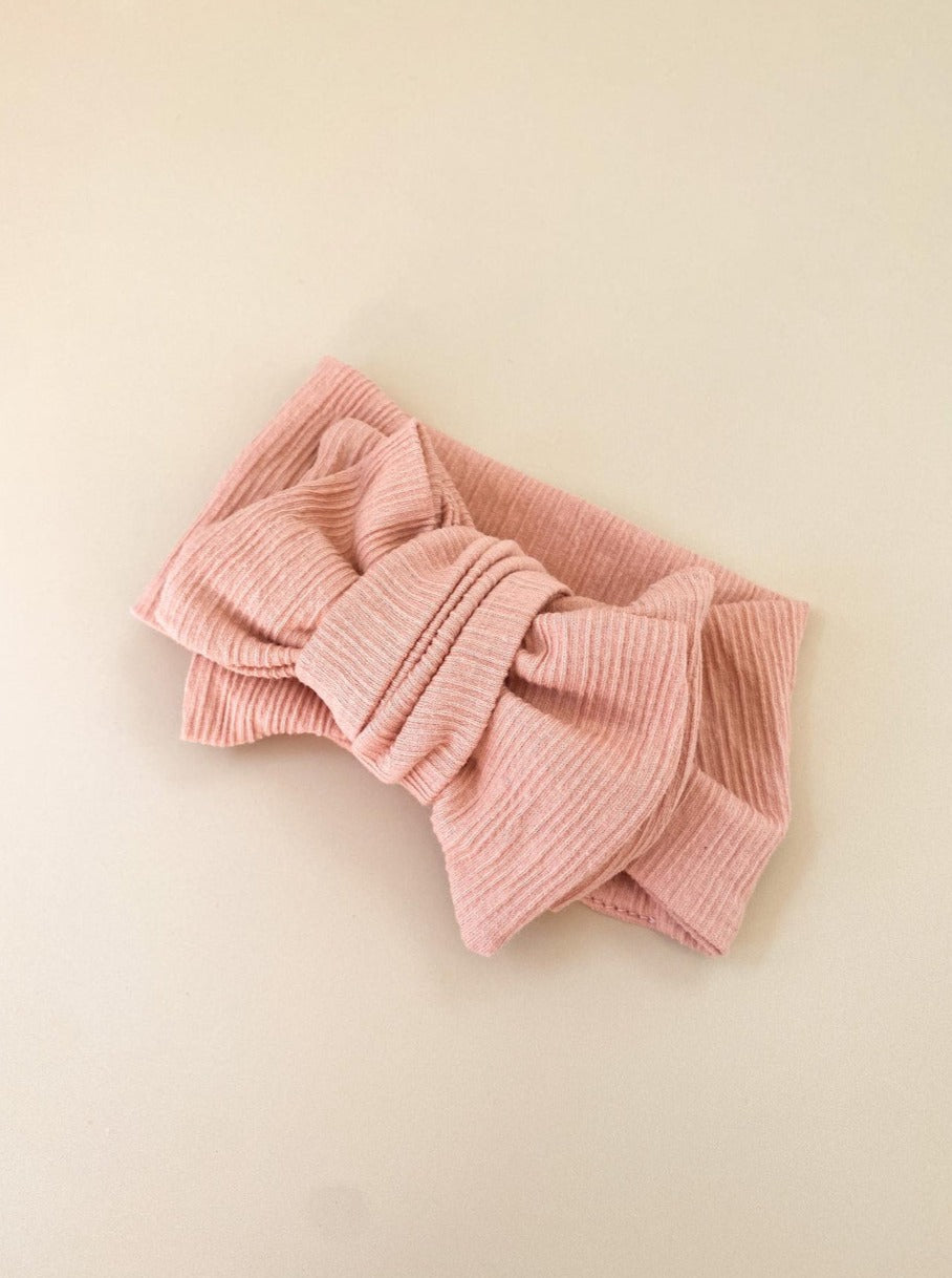 babies reevie oversized bow headband in pink textured fabric