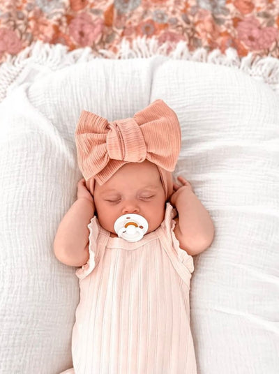 babies reevie oversized bow headband in dusty pink textured fabric