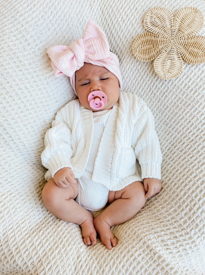 babies reevie oversized bow headband in pink textured fabric