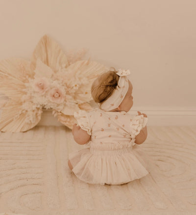 baby girl tulle romper in peaches print