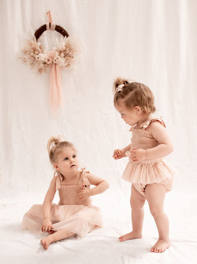 girls pink tulle dress and romper